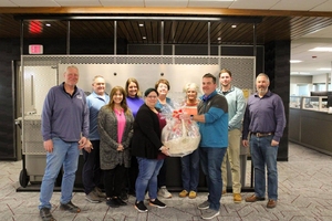 Schuster Accepts Palmer Candy Award.jpg