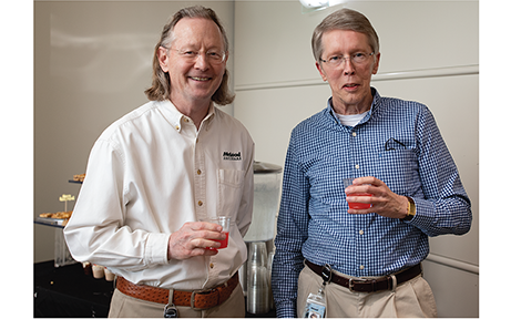 men sharing a drink