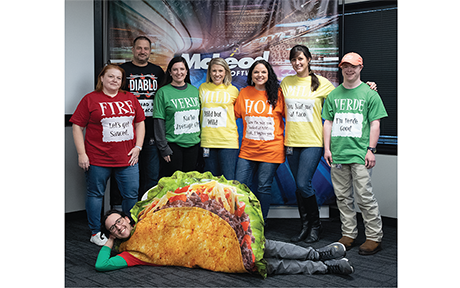 McLeod employees with different colored shirts