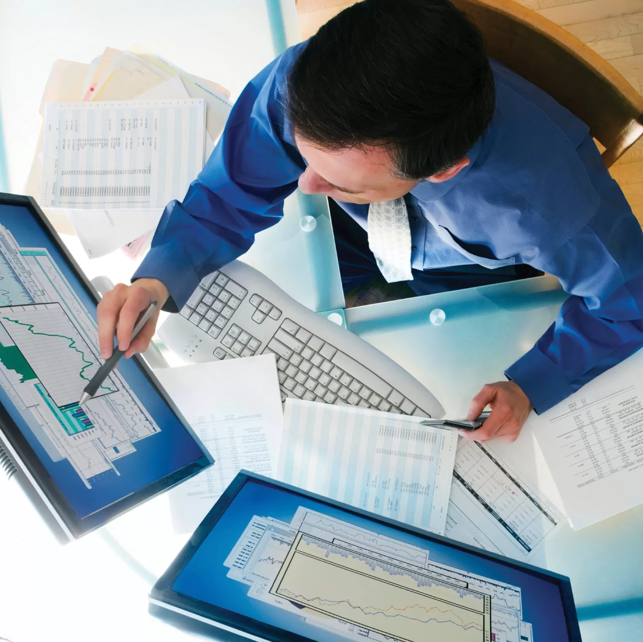 man-at-computer-overhead_1280sq