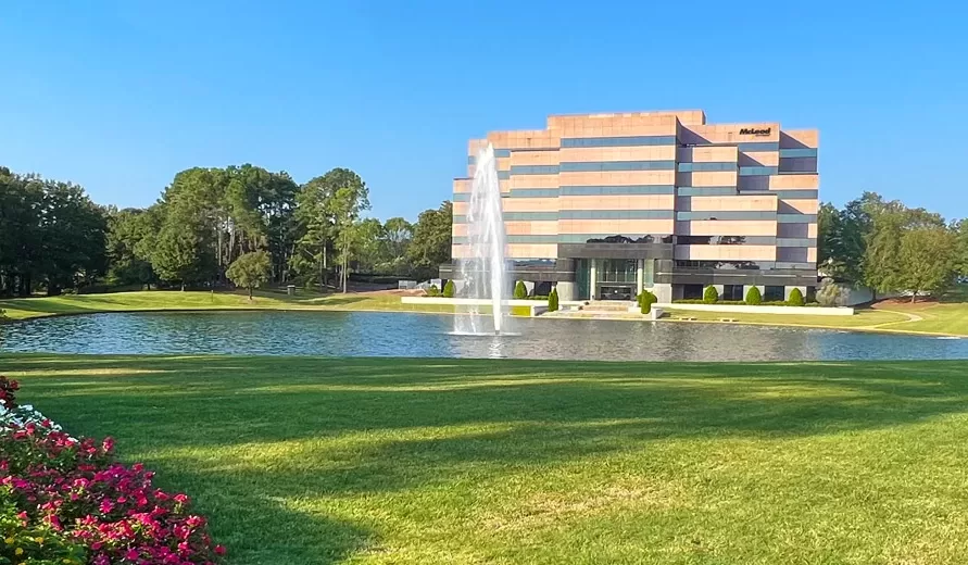 MB100_IMG_4804_943x521_w_sign_on_bldg-e1765811390103